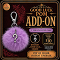 Purple pom-pom keychain with question mark charm on a promotional card for 'Good Luck Pom Add-On'.