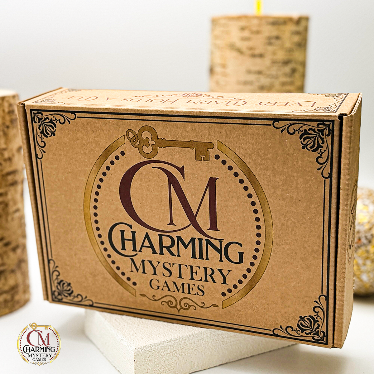 The outer retail packaging for the Charming Mystery Games products. It is kraft brown with the Charming Logo on it.