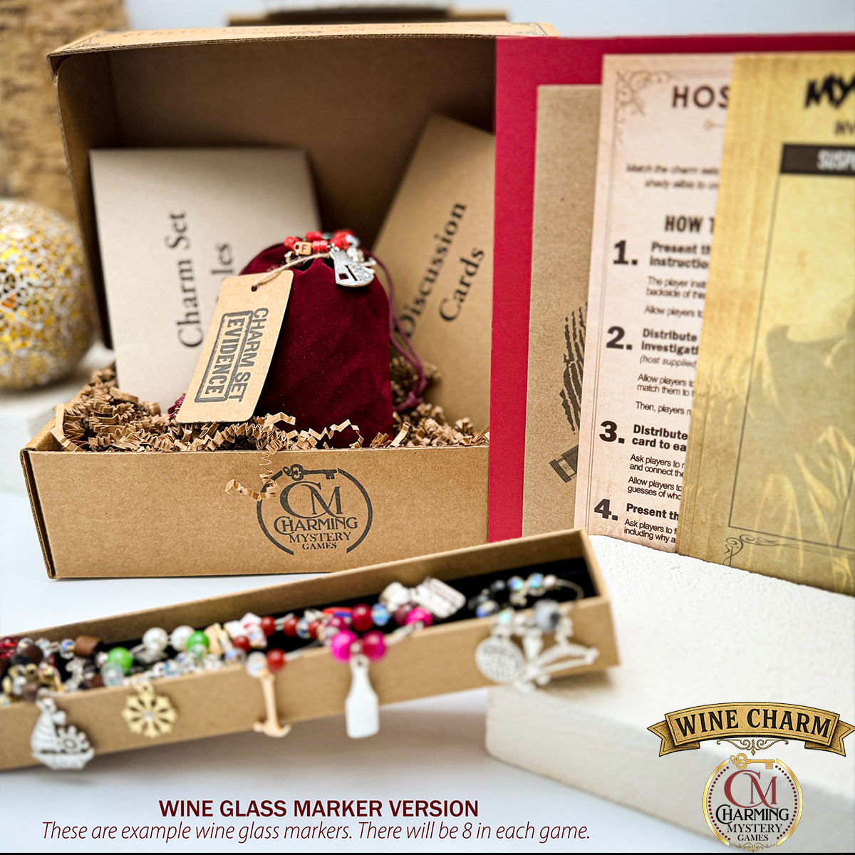 Packaging for the murder mystery party game, The Butler Didn't Do It. There are printed materials, a velveteen pouch, and envelopes full of cards inside of a box filled with kraft crinkle paper. There are five wine charm sets in a box in the front and another one coming out of the bag, showing that is where they will be placed in the kit. 