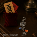 Charm set with decorative elements on a dark surface