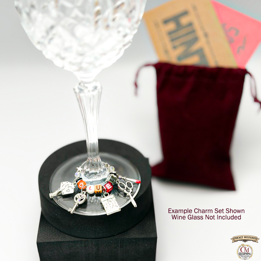 Wine glass charm holder with charms on a white background, wine glass not included.