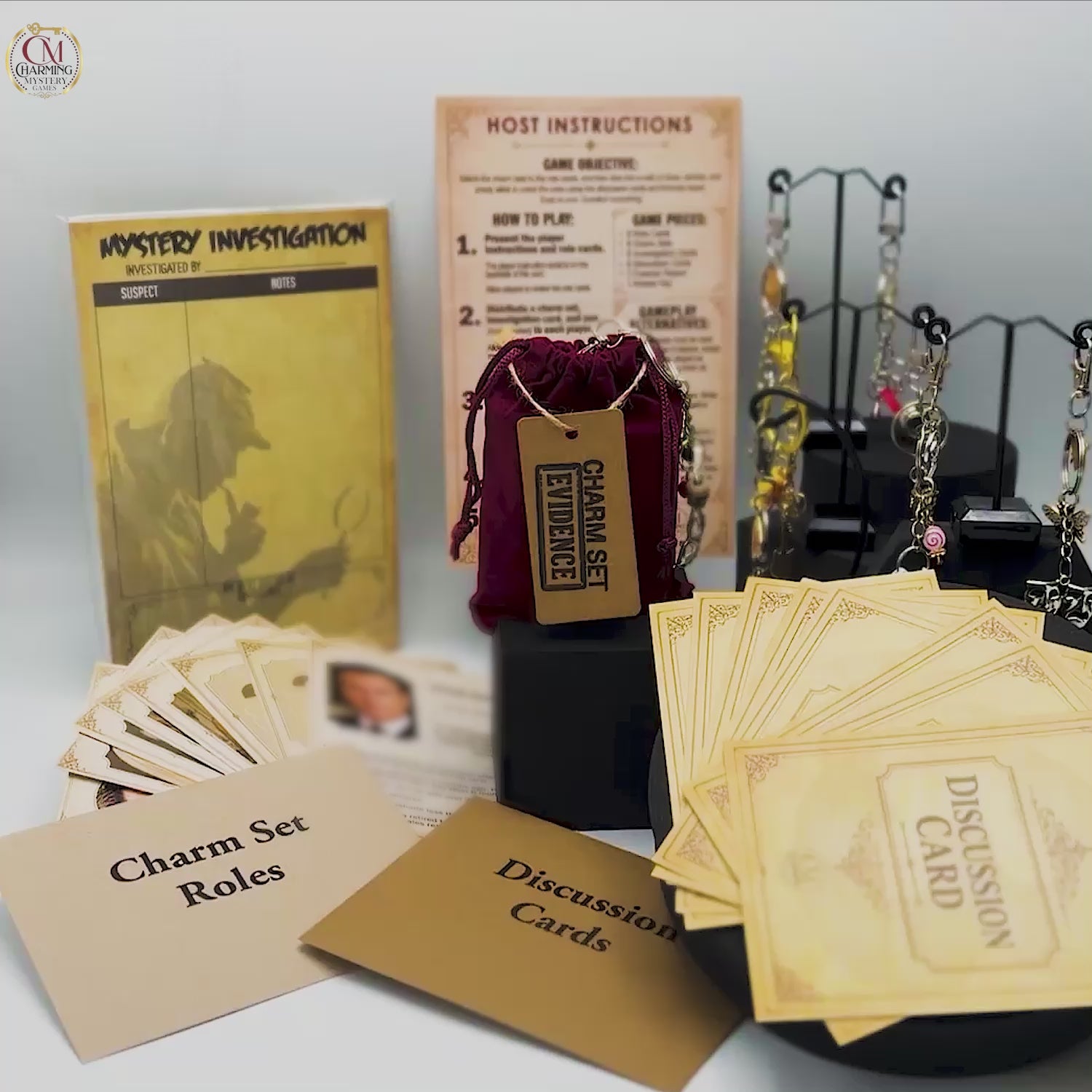 A video showing a murder mystery game kit. There are game cards and charm sets. 