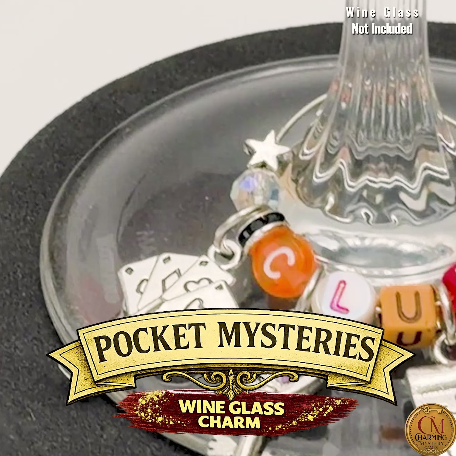 A video that pans over a wine glass stem charm marker for a mystery party game. 