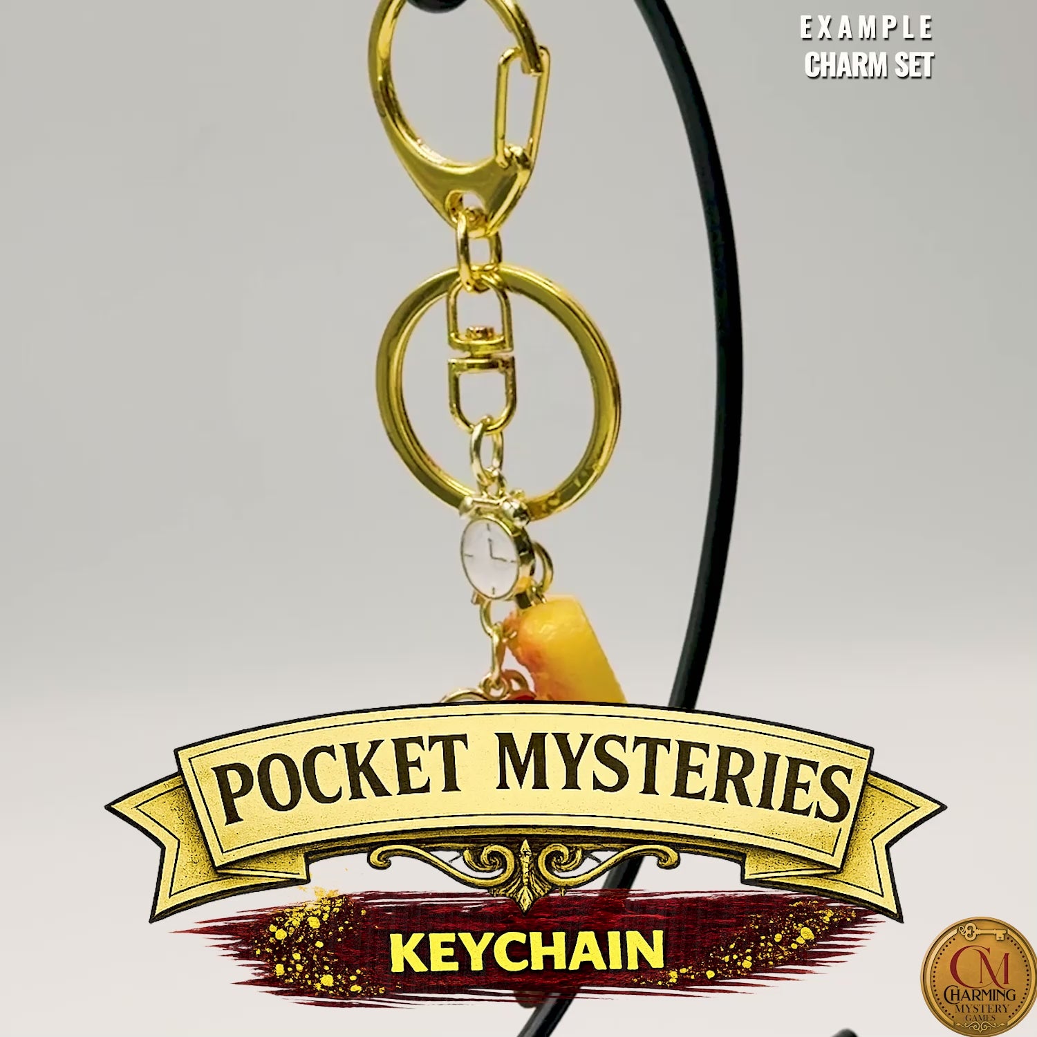 A video where the camera pans across a gold keychain for a murder mystery party game.