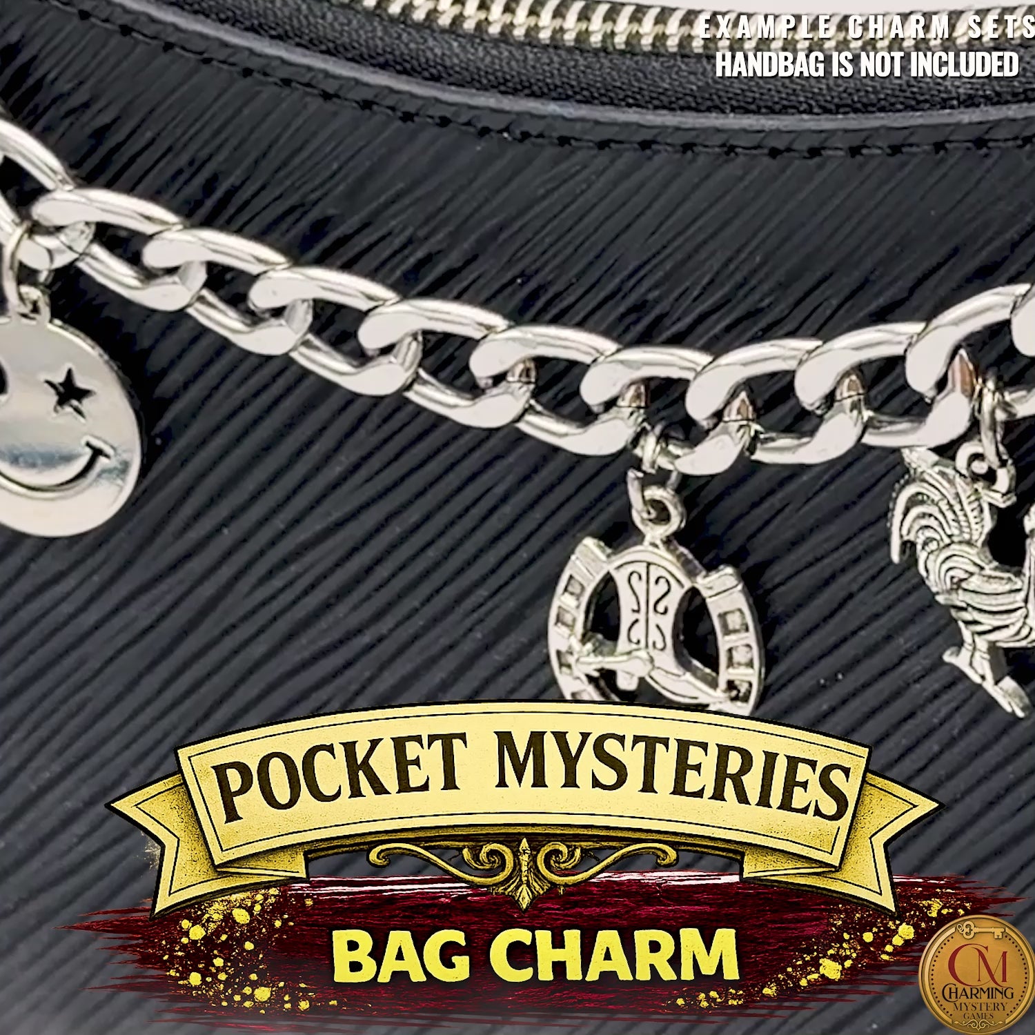 A video where the camera pans to reveal a double buckle silver bag charm.