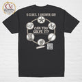 Product mockup of a black tee shirt that has a mystery challenge on it. It says Can You Solve It? 