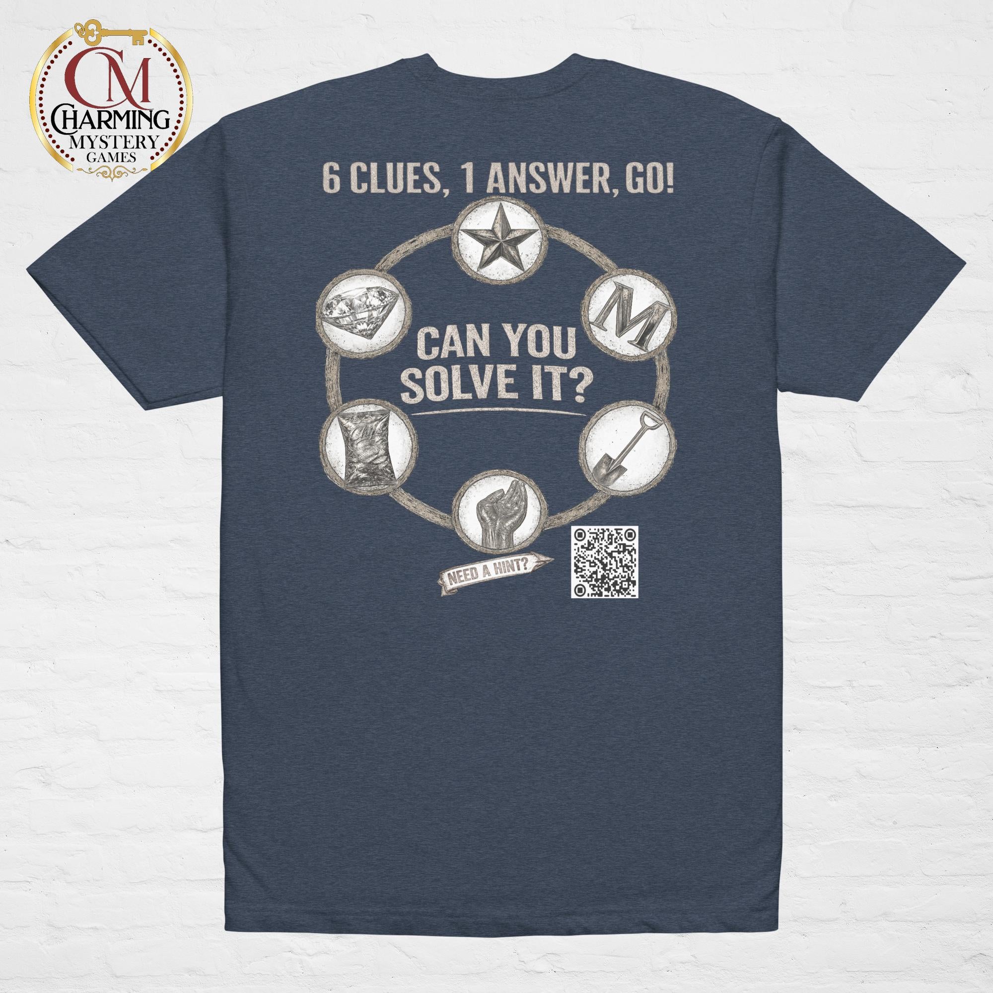 Product mockup of a blue tee shirt that has a mystery challenge on it. It says Can You Solve It? 